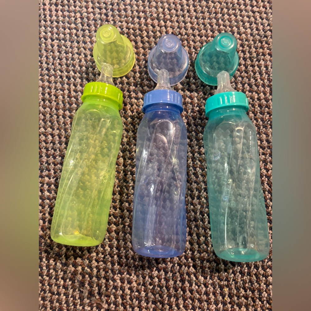 3 evenflo bottles. Used 2X. Wicked fast shipping.